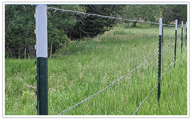 Arvada commercial barbed wire fence