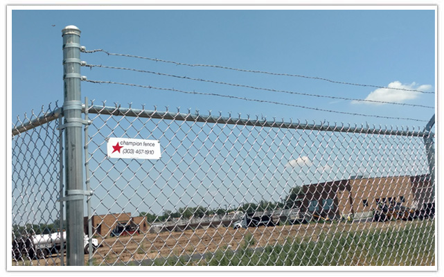 Arvada commercial barbed wire fence